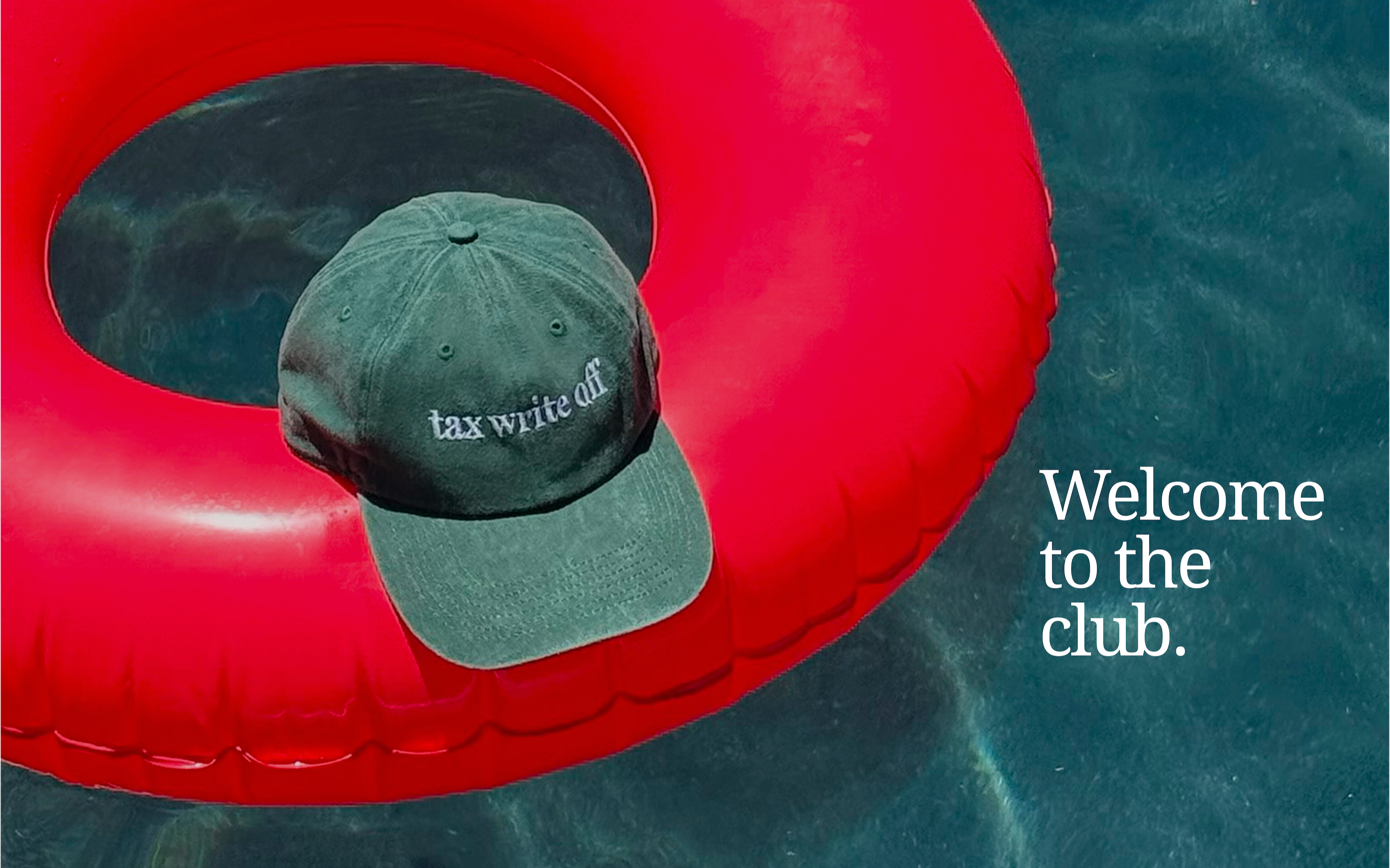 Green cap with 'tax write off' text on a red inflatable ring in water, with text 'Welcome to the club.'